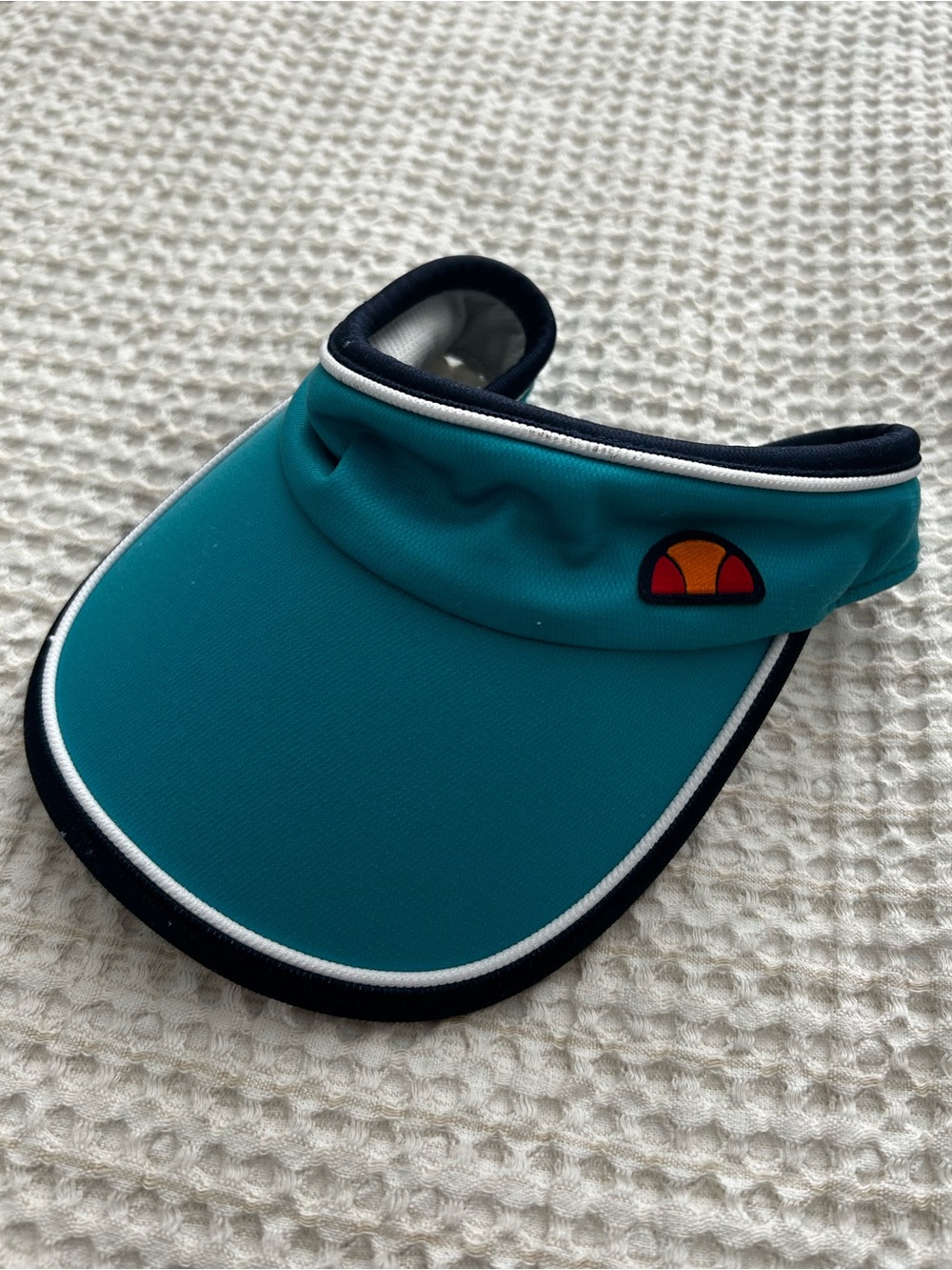 Ellesse Teal Visor with Navy & White Trim
